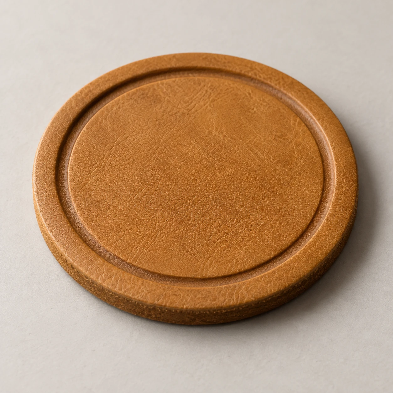 Ochre Leather Coaster · Debossed Depth